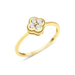 yellow gold four-leaf clover ring with White CZ stones on white background