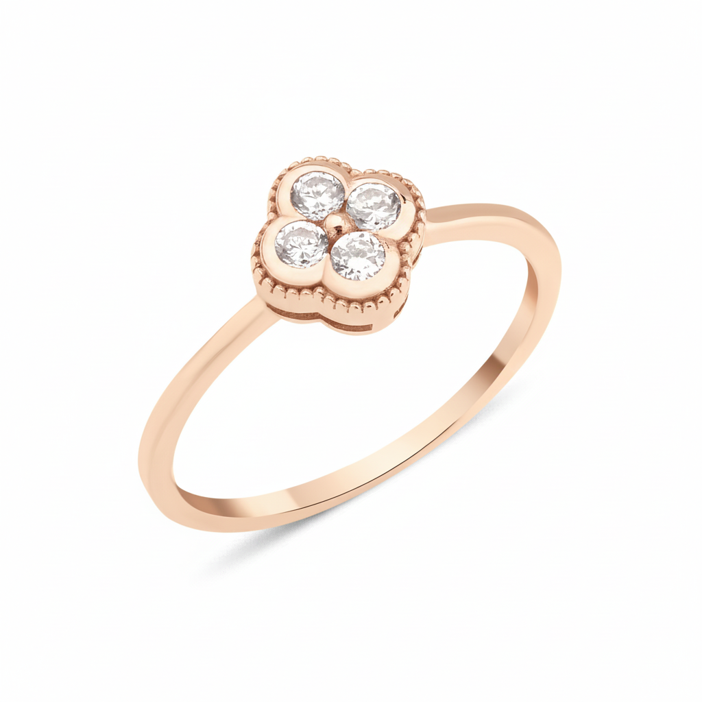 rose gold four-leaf clover ring with White CZ stones on white background