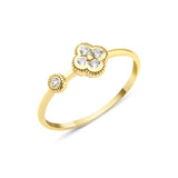 yellow gold clover accent ring with White CZ stones on white background