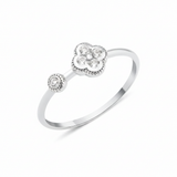 white gold clover accent ring with White CZ stones on white background