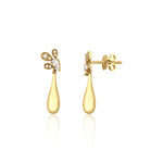 yellow gold petal drop earrings with a pear-cut stone on white background