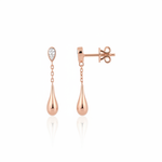 rose gold chain teardrop earrings with a pear-cut stone on white background