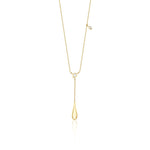 yellow gold lariat drop necklace on white background