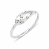 white gold star-set dome ring with flush-set stones on white background