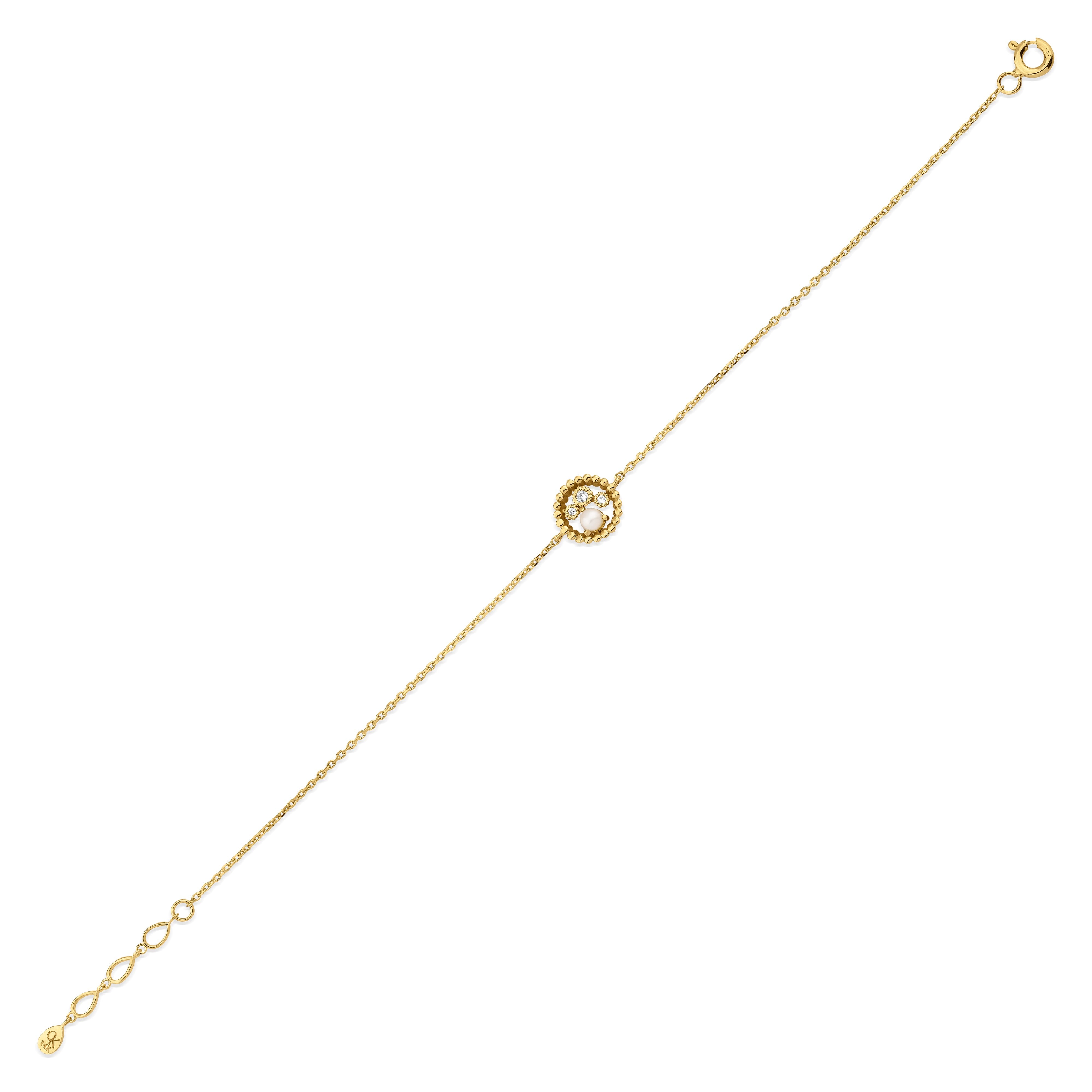 yellow gold beaded halo bracelet with a pearl and clear stones on white background