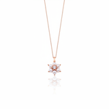 rose gold floral cluster pendant necklace with pearls on white background