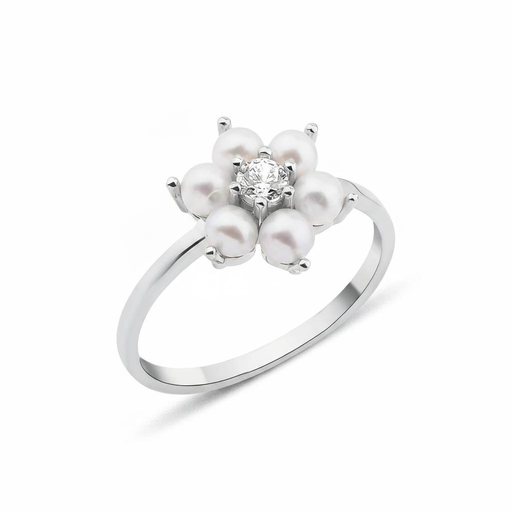 white gold floral band ring with pearls on white background