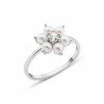 white gold floral band ring with pearls on white background