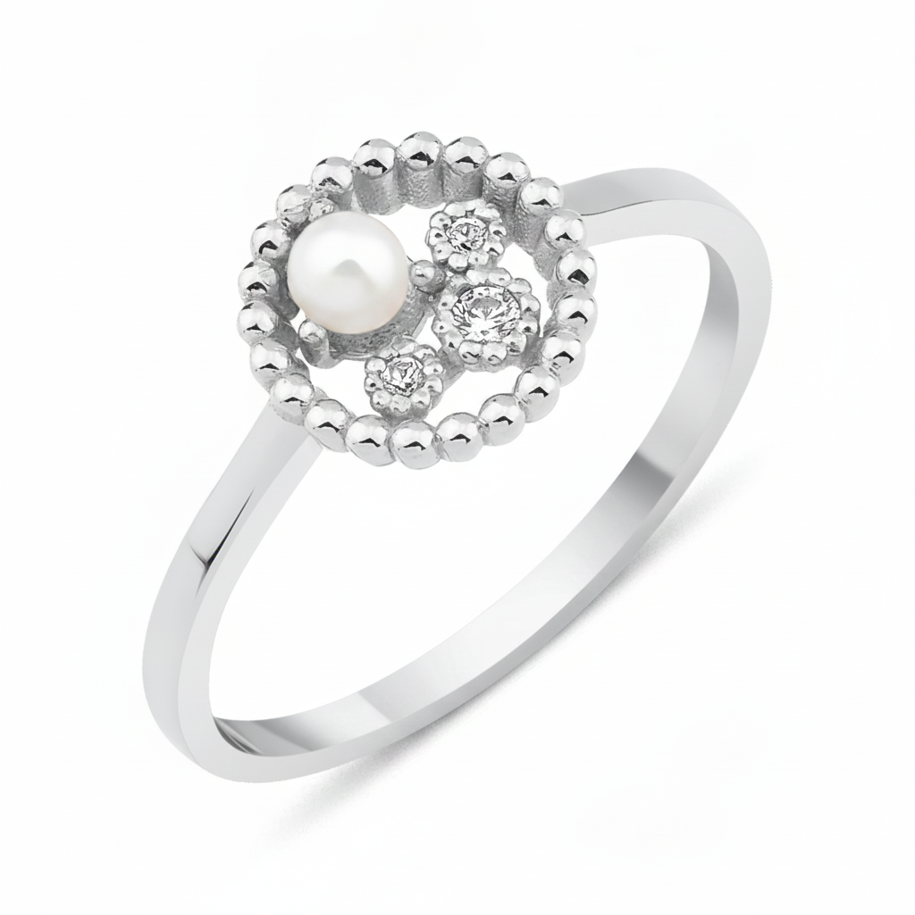 white gold asymmetrical halo ring with a pearl on white background