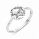 white gold asymmetrical halo ring with a pearl on white background