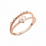 rose gold solitaire pearl ring on white background