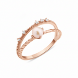rose gold solitaire pearl ring on white background