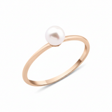 rose gold slim band pearl ring on white background