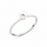 white gold slim band pearl ring on white background