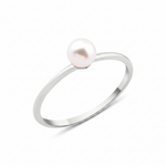 white gold criss-cross ring with a pearl and a marquise stone on white background