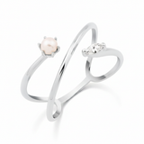 white gold split band ring with a pearl on white background