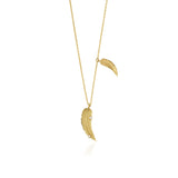 yellow gold double feather pendant necklace on white background