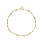 yellow gold cadence chain bracelet with White CZ stones on white background