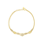 yellow gold double strand bracelet with White CZ stones on white background