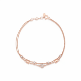 rose gold double strand bracelet with White CZ stones on white background