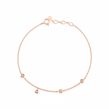 geometric station charm bracelet in rose gold on white background