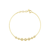 starburst station bracelet in yellow gold on white background