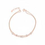 double strand bracelet in rose gold on white background