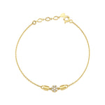 medallion disc bracelet in yellow gold on white background