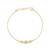 medallion disc bracelet in yellow gold on white background