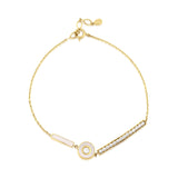 inlay disc bracelet in yellow gold on white background
