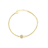 pave disc bracelet in yellow gold on white background