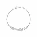 floating circle bracelet in white gold on white background