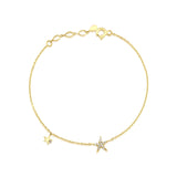 twin star bracelet in yellow gold on white background