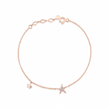 twin star bracelet in rose gold on white background