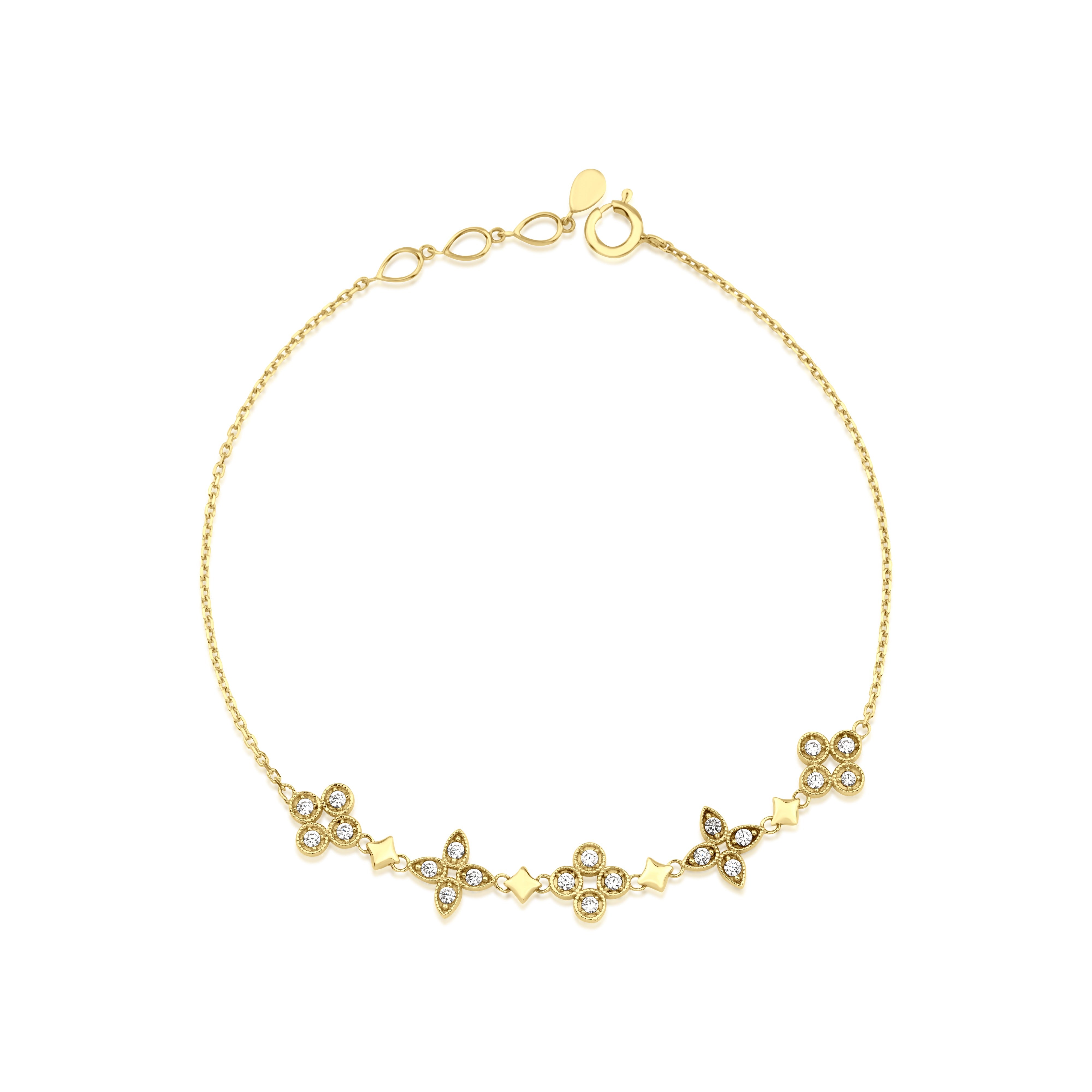 star cluster bangle in yellow gold on white background