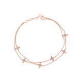 layered bloom bracelet in rose gold on white background