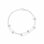 layered bloom bracelet in white gold on white background