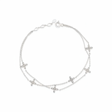 layered bloom bracelet in white gold on white background