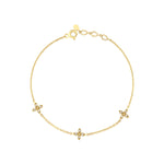 triple bloom bracelet in yellow gold on white background