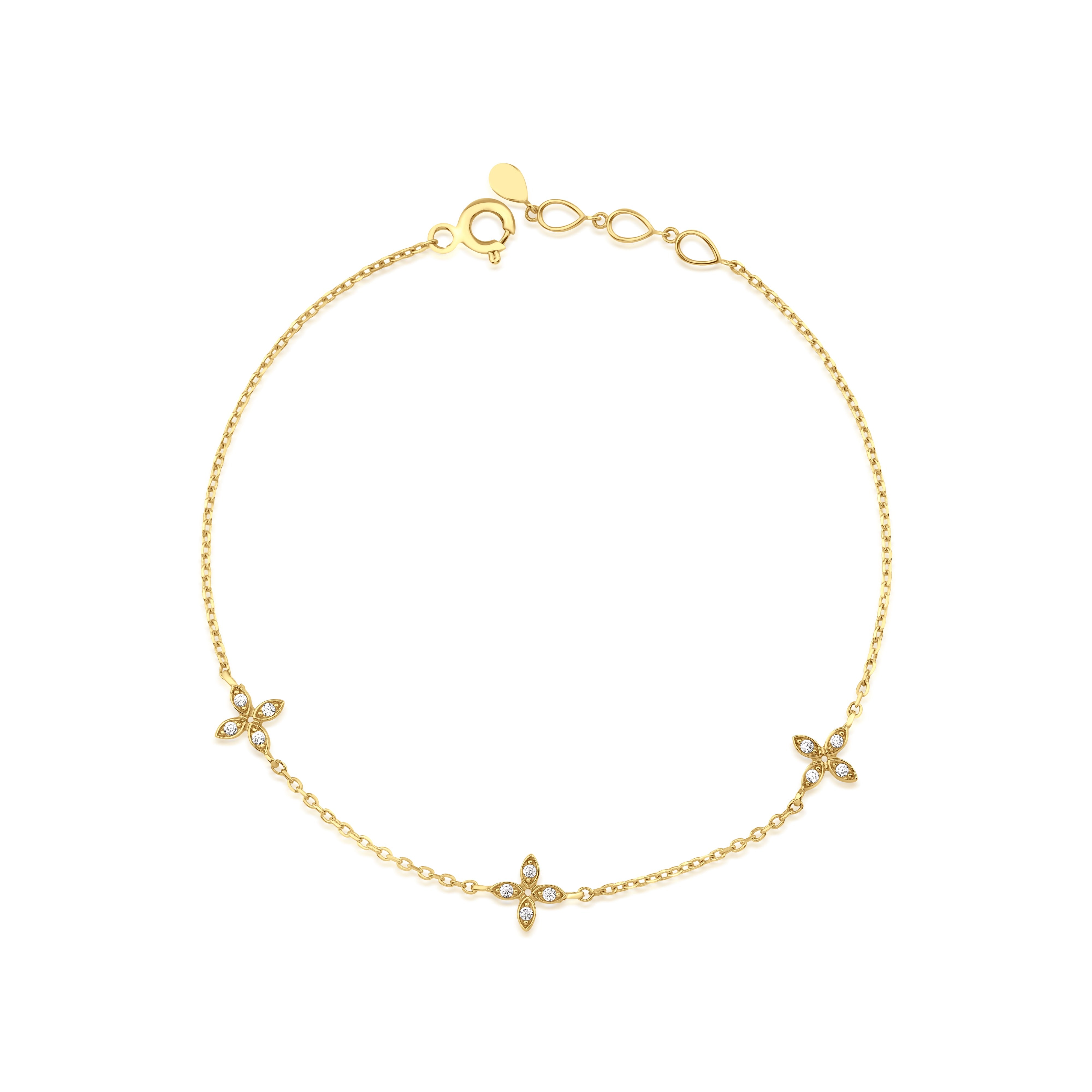 triple bloom bracelet in yellow gold on white background