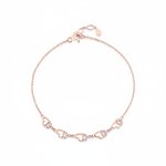 open heart bracelet in rose gold on white background
