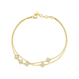 clover strand bracelet in yellow gold on white background