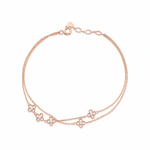 clover strand bracelet in rose gold on white background