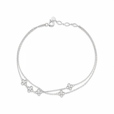 clover strand bracelet in white gold on white background