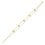 beaded heart bracelet in yellow gold on white background