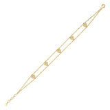 beaded heart bracelet in yellow gold on white background