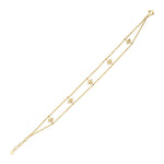 beaded starburst bracelet in yellow gold on white background