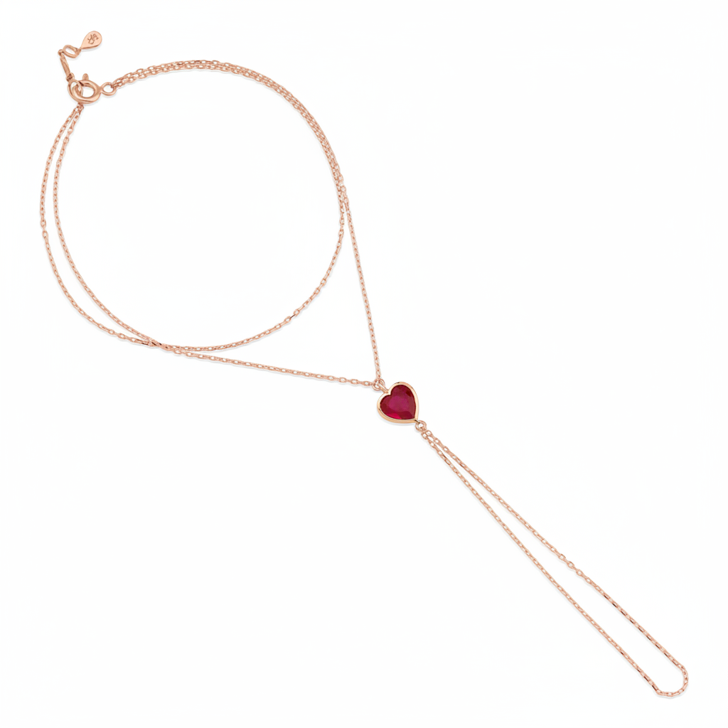 crimson heart hand chain bracelet in rose gold on white background