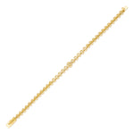 filigree medallion bracelet in yellow gold on white background
