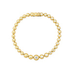 half radiance bracelet in yellow gold on white background